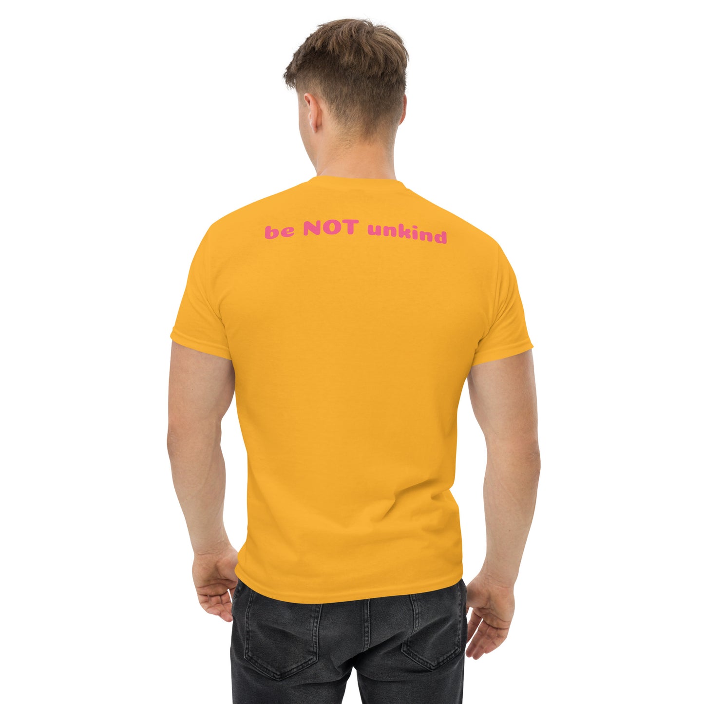 Man wearing a yellow gold t-shirt on a white background