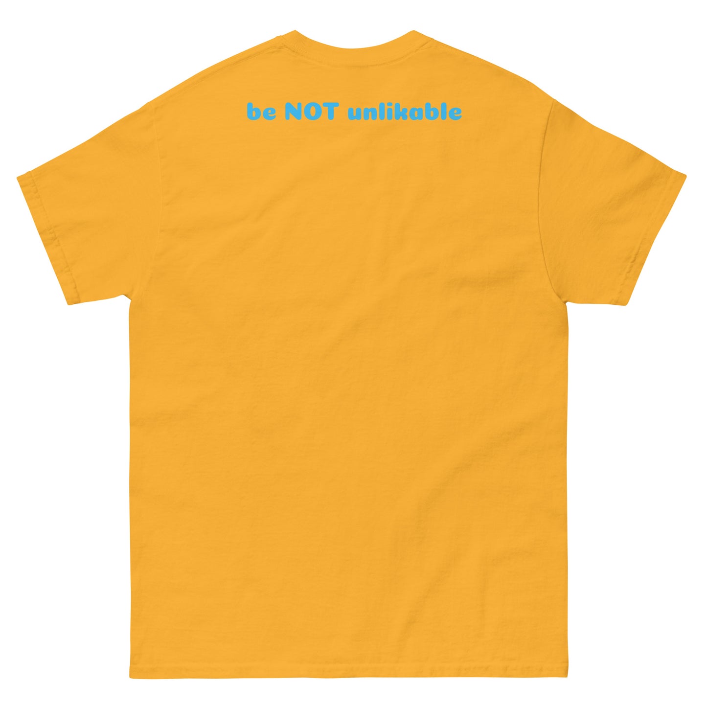Yellow gold t-shirt with text 'be NOT unlikable' on the back against a white background