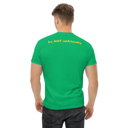Person wearing a green t-shirt with text on the back, standing against a white background