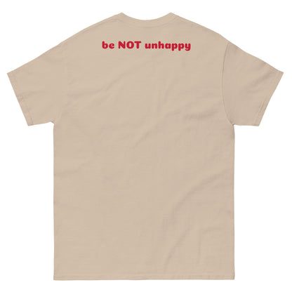 sand t-shirt with 'be NOT unhappy' text on the back against a white background
