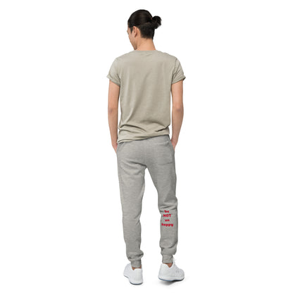Person wearing a gray t-shirt and gray sweatpants with text on a white background