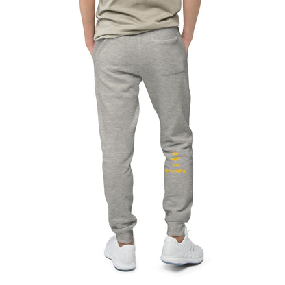 Person wearing gray sweatpants with text on a white background