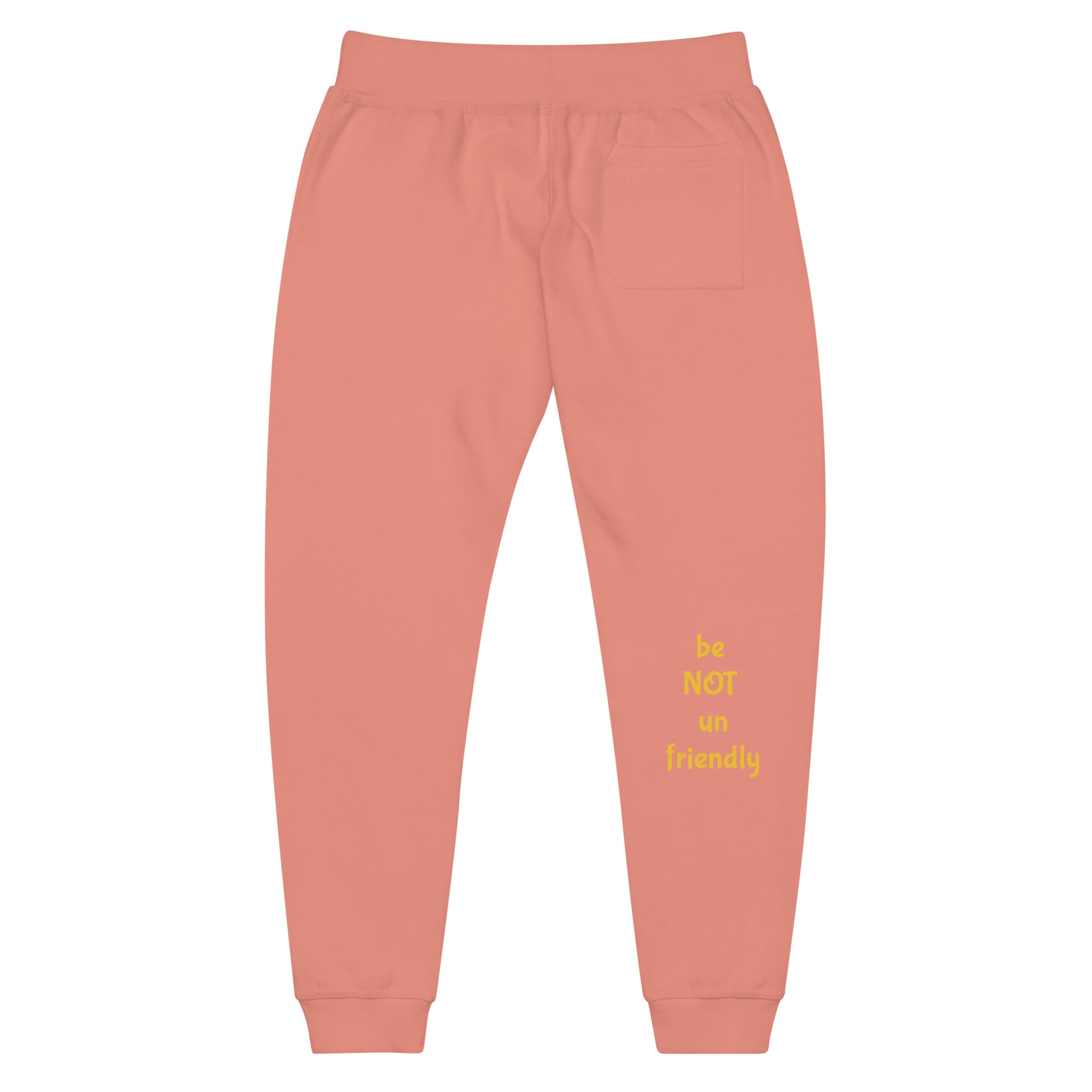 Coral sweatpants with yellow text on a white background