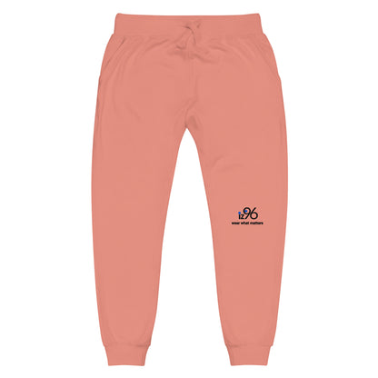 rose pink sweatpants with a logo on a white background
