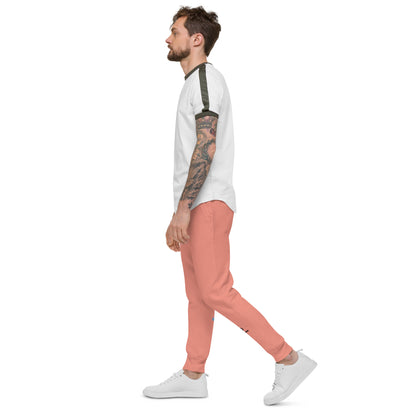 Man wearing a white long-sleeve shirt and rose pink pants on a white background