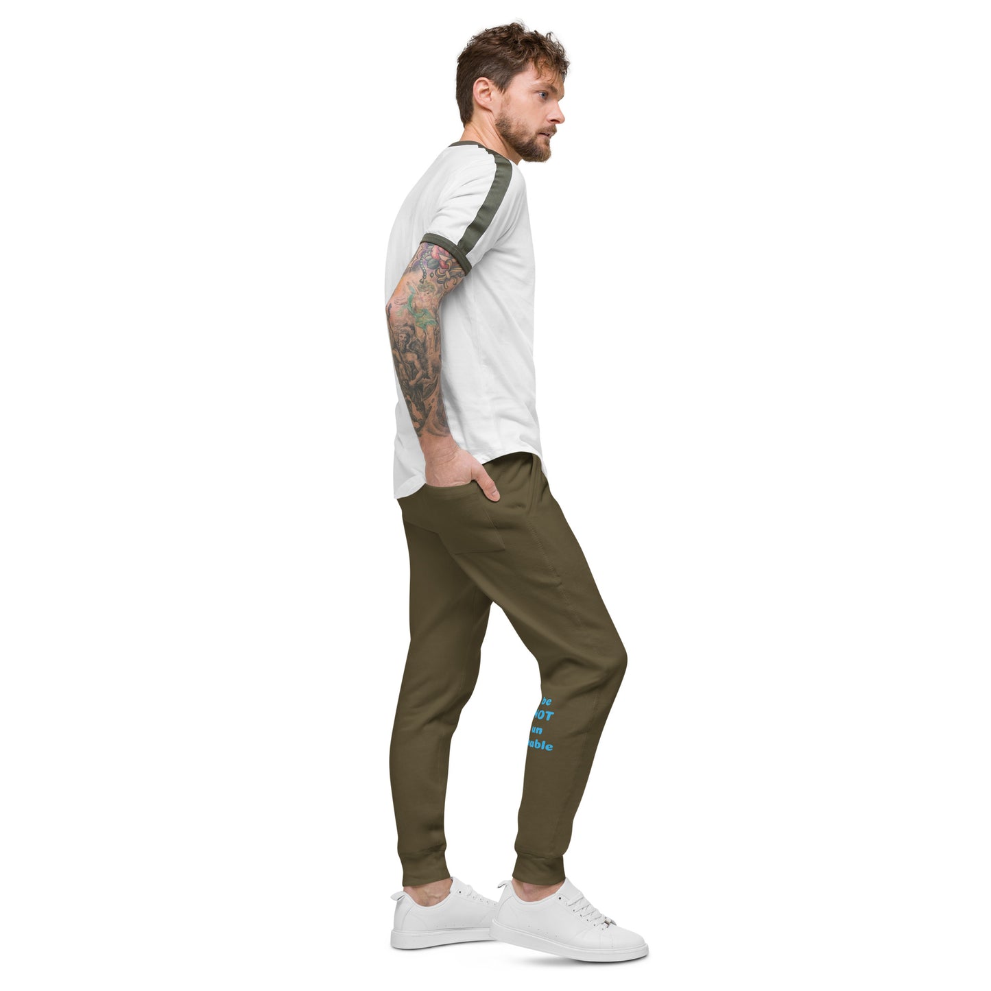 Man wearing a white t-shirt and military green pants on a white background