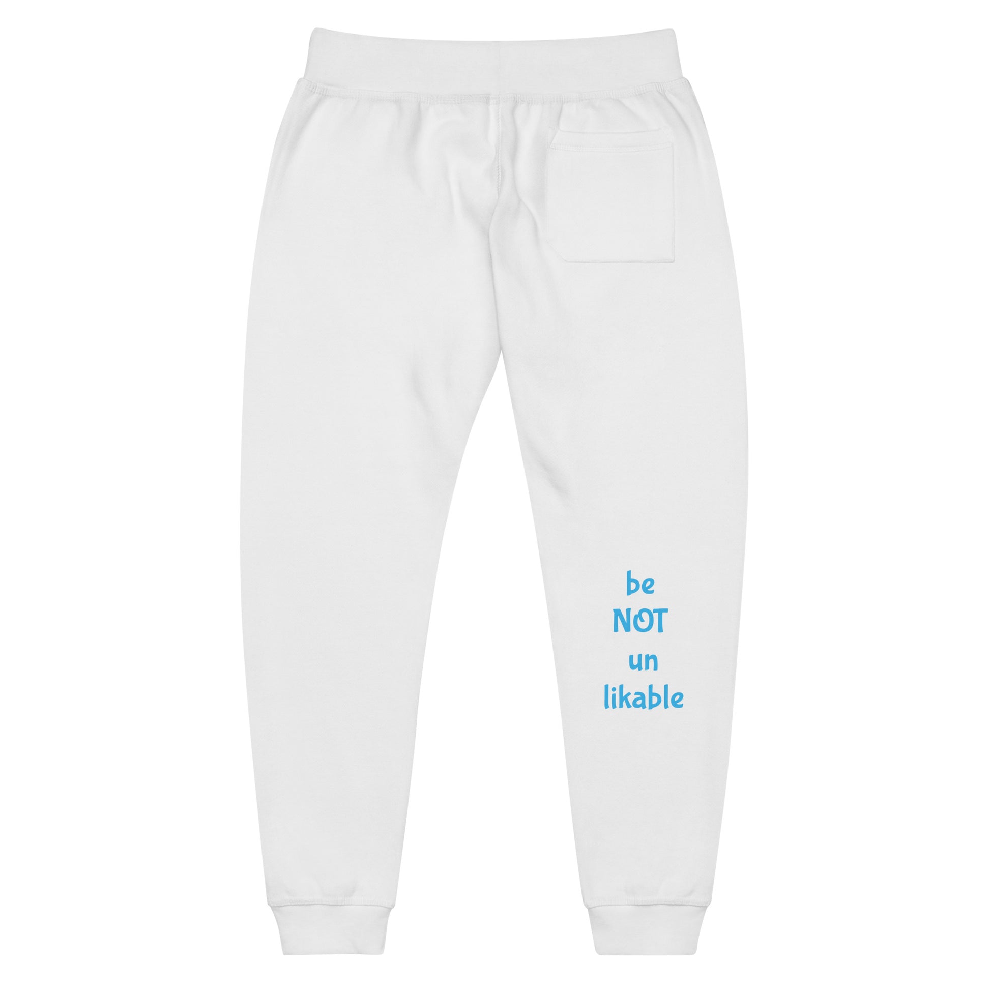 White sweatpants with blue text 'be NOT unlikable' on a white background