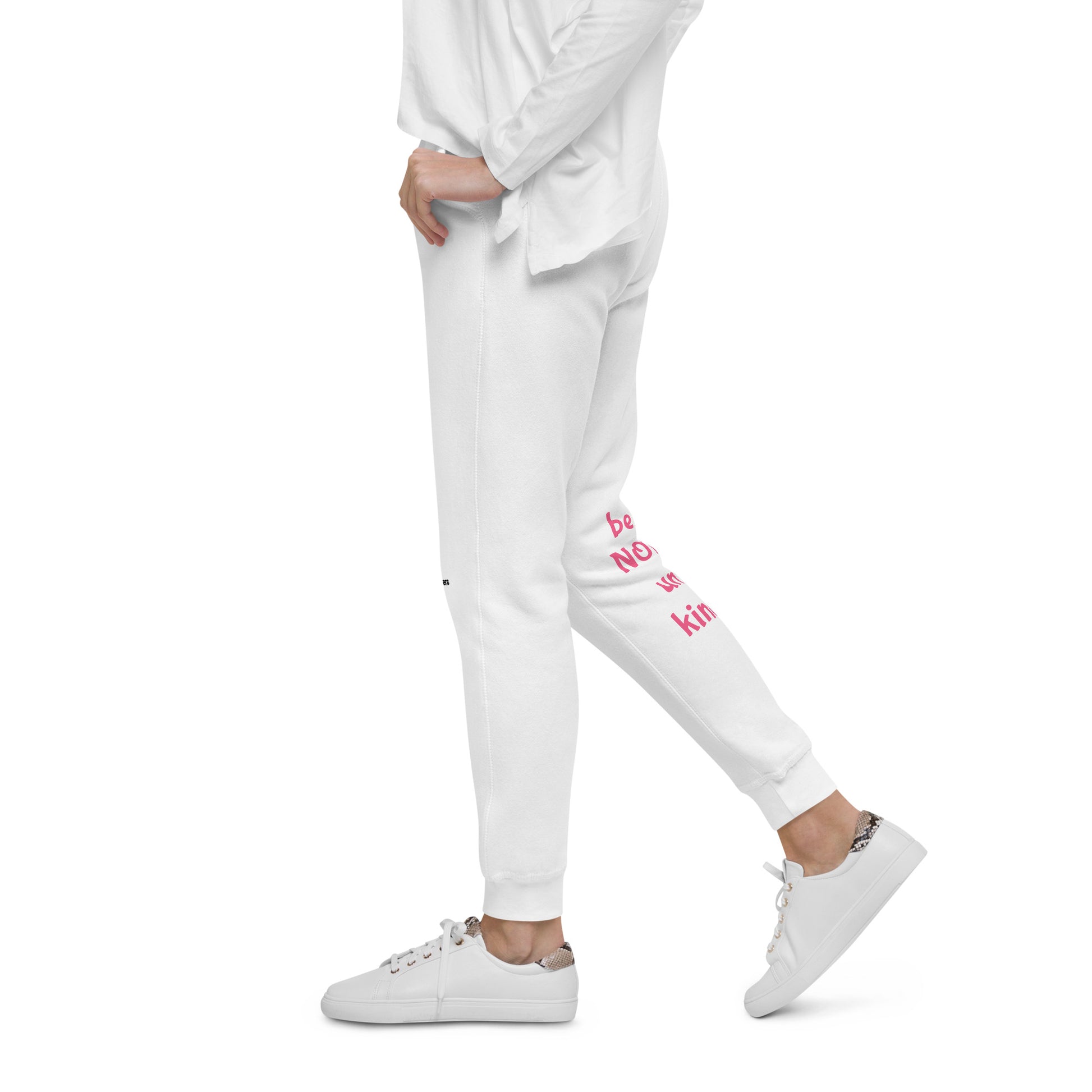 White jogger pants with pink text on a white background