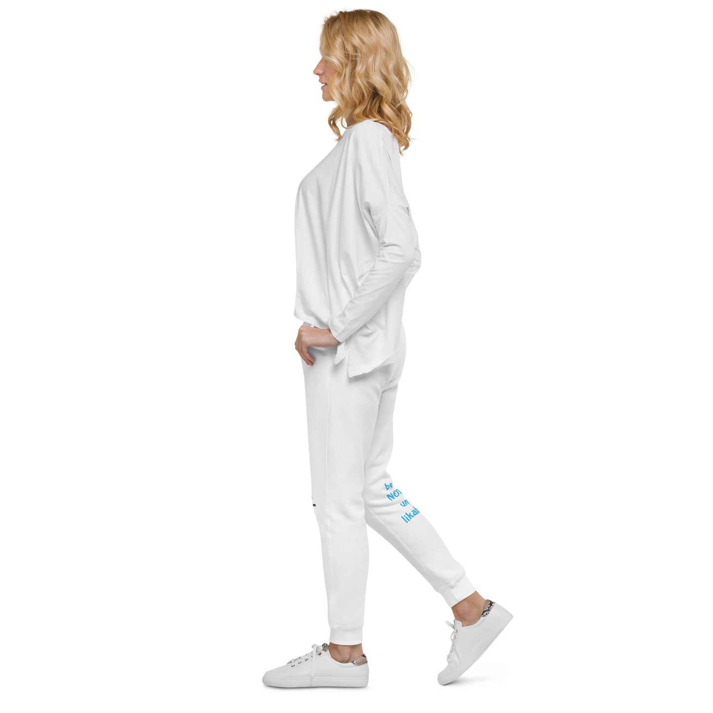 Woman wearing a white tracksuit with blue text on a white background