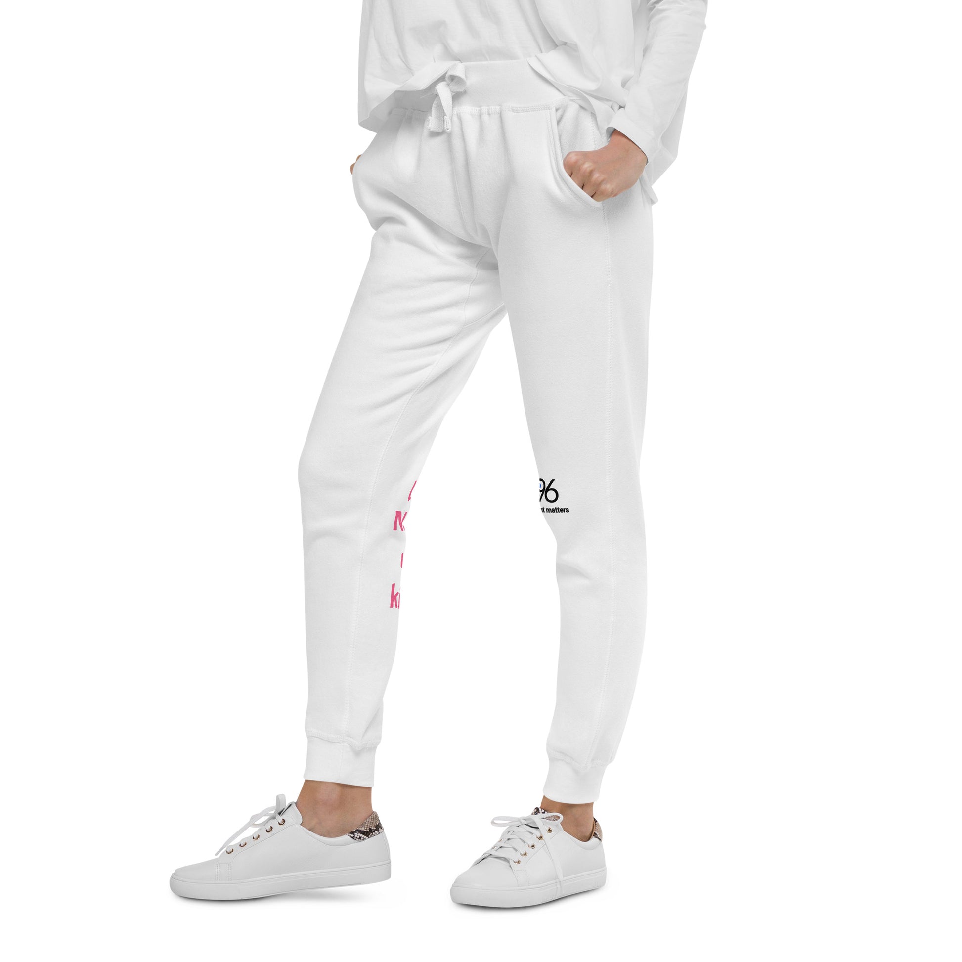 White jogger pants with pink text on a white background