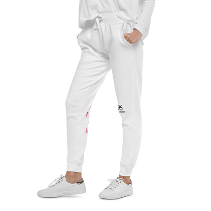White jogger pants with pink text on a white background