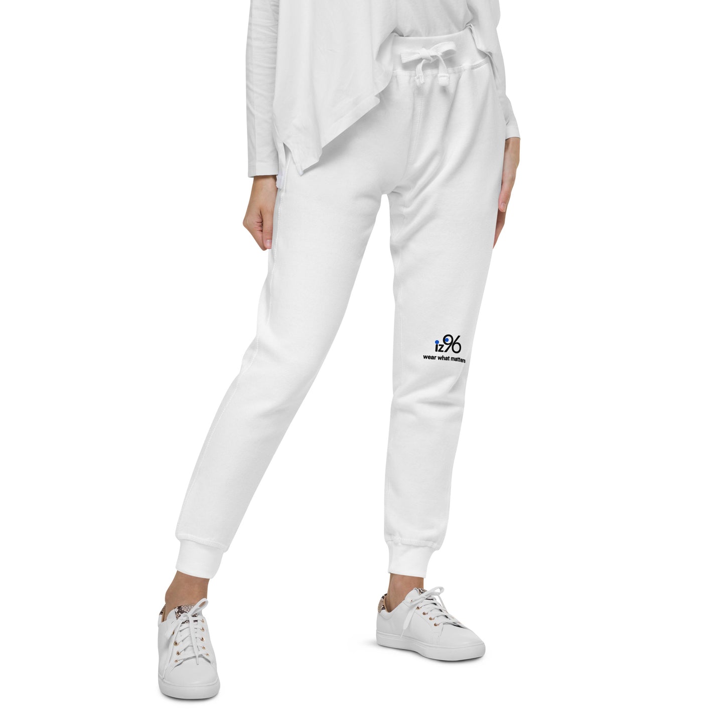 hite jogger pants with a logo on a white background