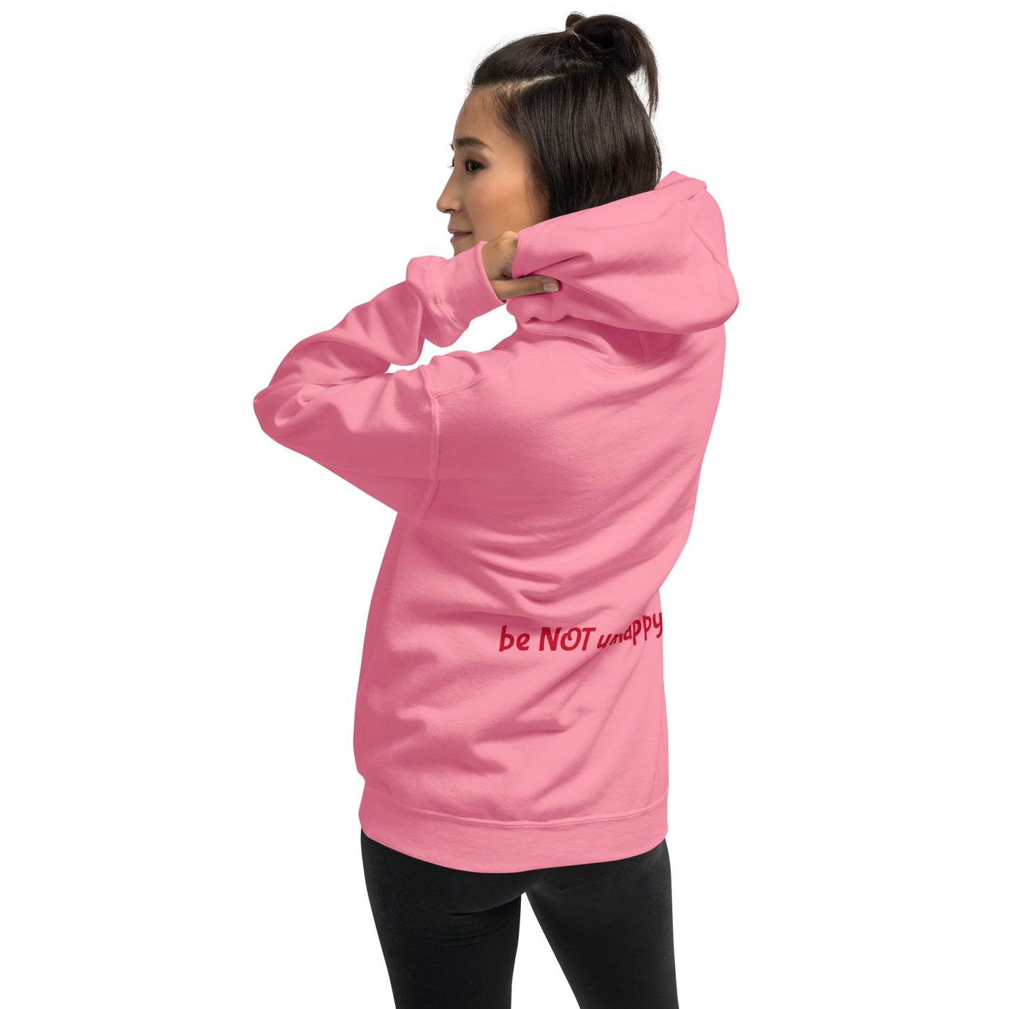 Person wearing a pink hoodie on a white background