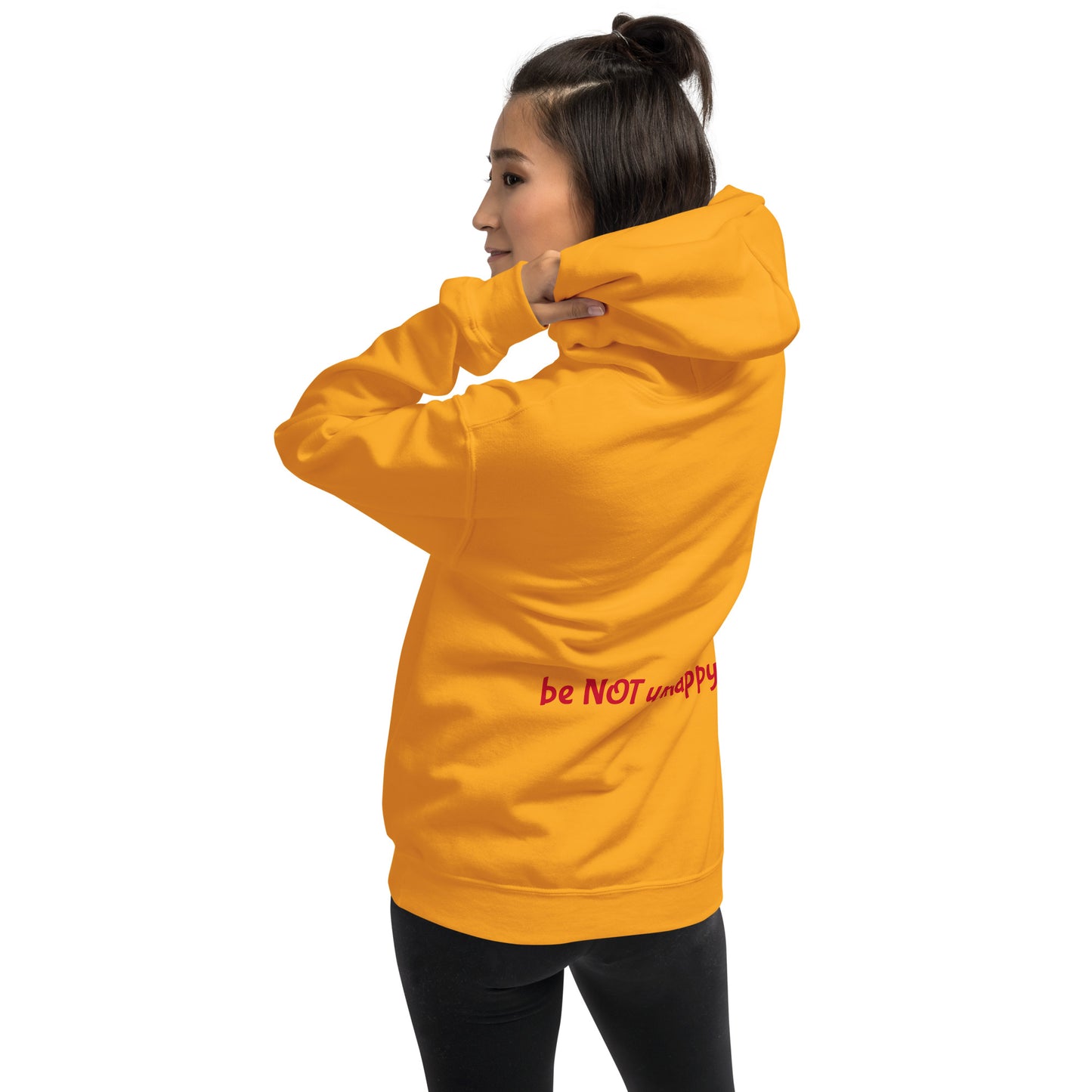 Person wearing a yellow gold hoodie on a white background