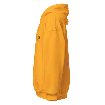 Sunny yellow gold hoodie with 'be NOT unkind' text on the back against a white background