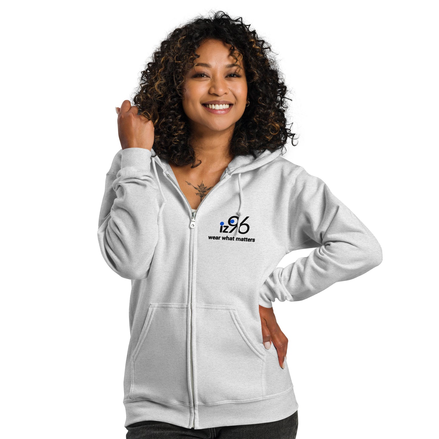 Woman wearing ash gray hoodie with a logo on a white background