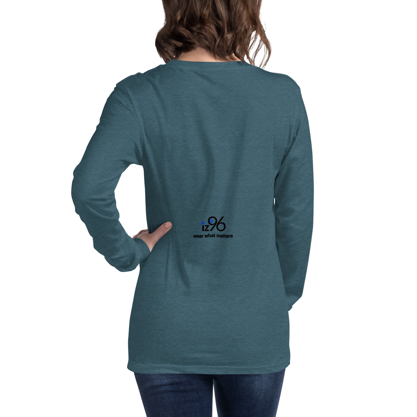 Person wearing a teal long-sleeve shirt with a logo on a white background