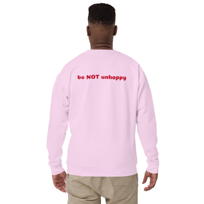 Person wearing a lavender long-sleeve shirt with 'be NOT unhappy' text on the back, standing against a white background.
