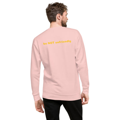 Man wearing a light pink long-sleeve shirt on a white background