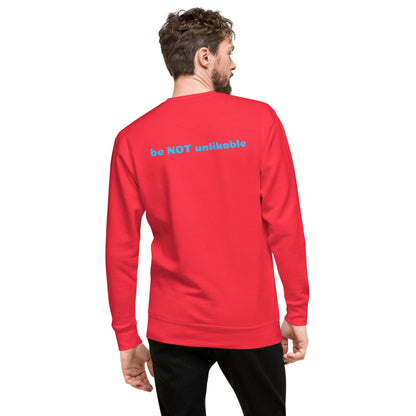 Person wearing a red sweatshirt with text on the back against a white background
