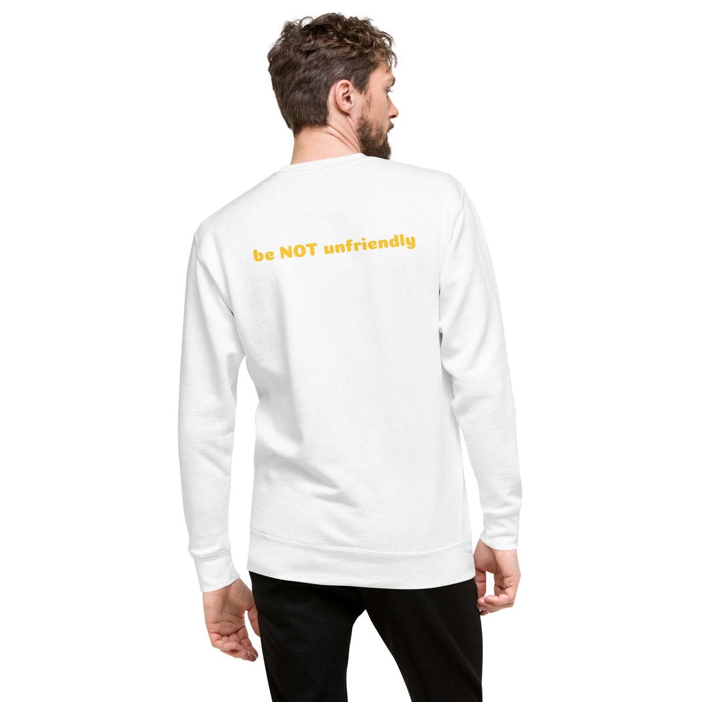 Man wearing a white long-sleeve shirt with 'be NOT unfriendly' text on the back against a white background
