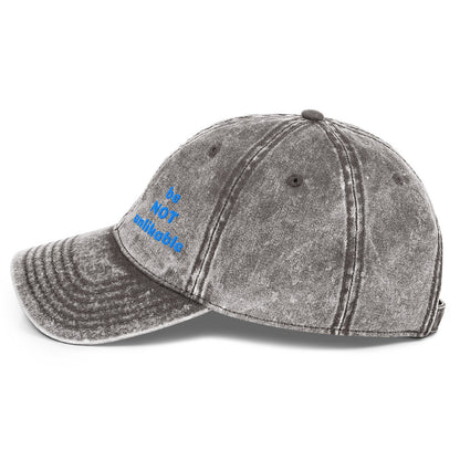 Gray distressed baseball cap with blue text on a white background
