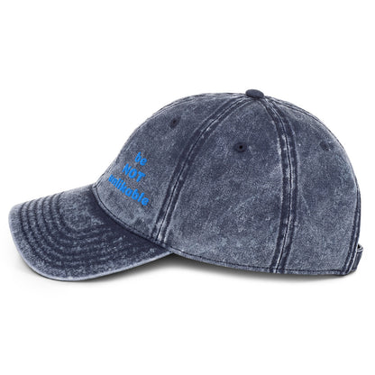 Blue distressed baseball cap with text on a white background