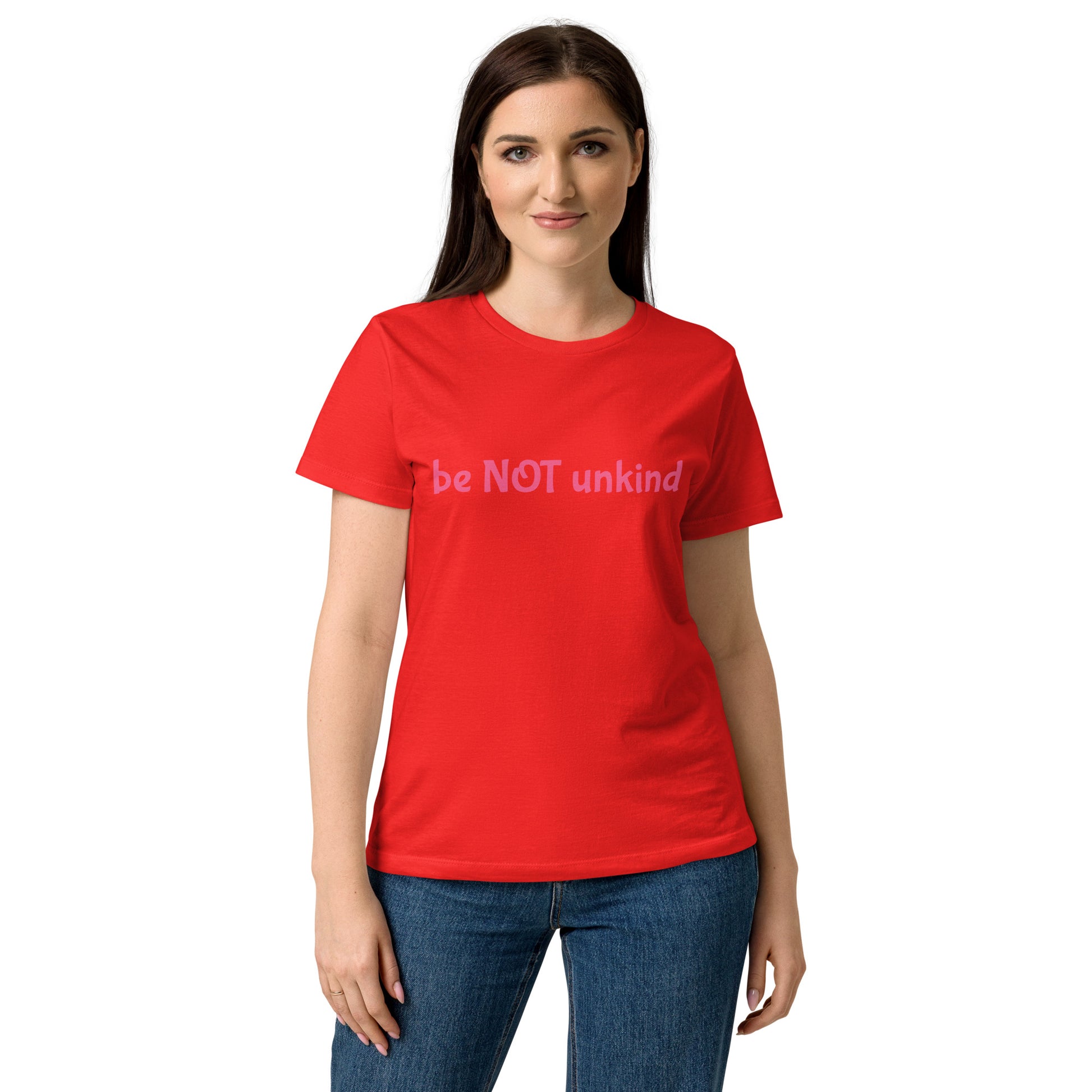 Woman wearing a cherry red t-shirt with colorful graphic and white background