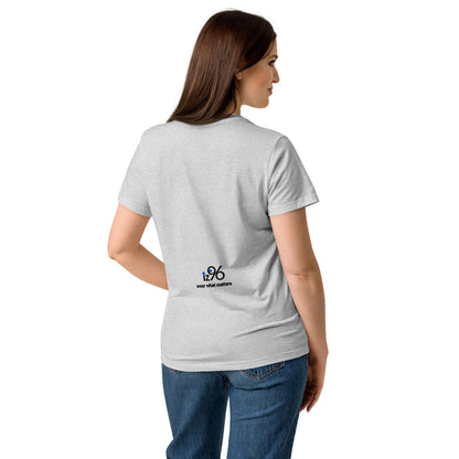 Woman wearing a gray t-shirt with a logo on the back, standing against a white background