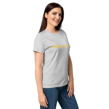 Woman wearing a gray t-shirt with a graphic design on a white background