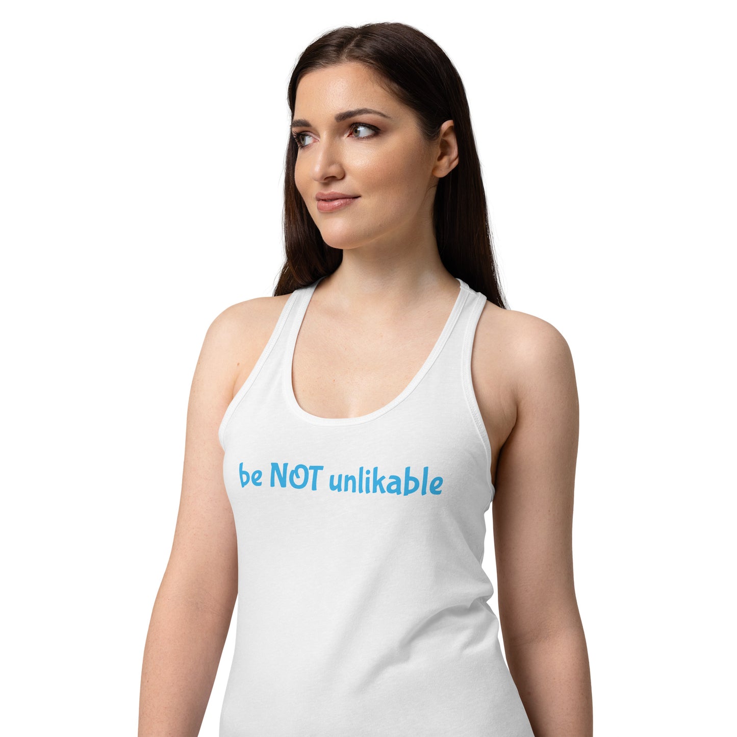 Woman wearing a white tank top with 'be NOT unlikable' text on a white background