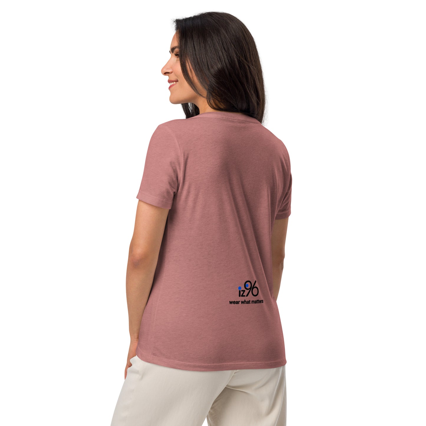 Woman wearing a pink t-shirt with a logo on the back against a white background