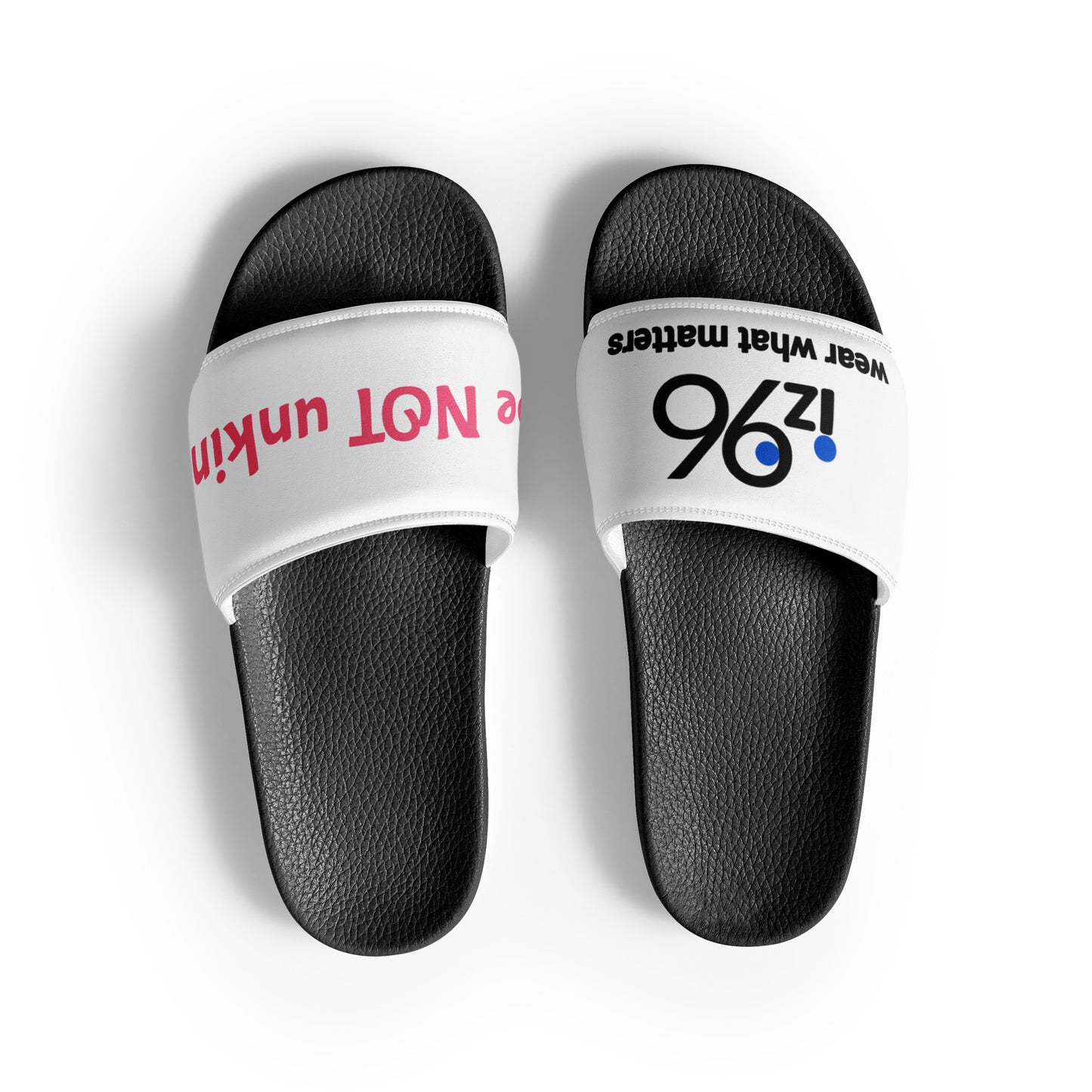 Black slide sandals with white straps featuring text on a white background