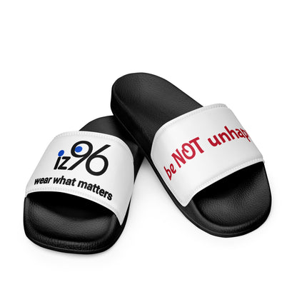 Black slides with white straps featuring text on a white background