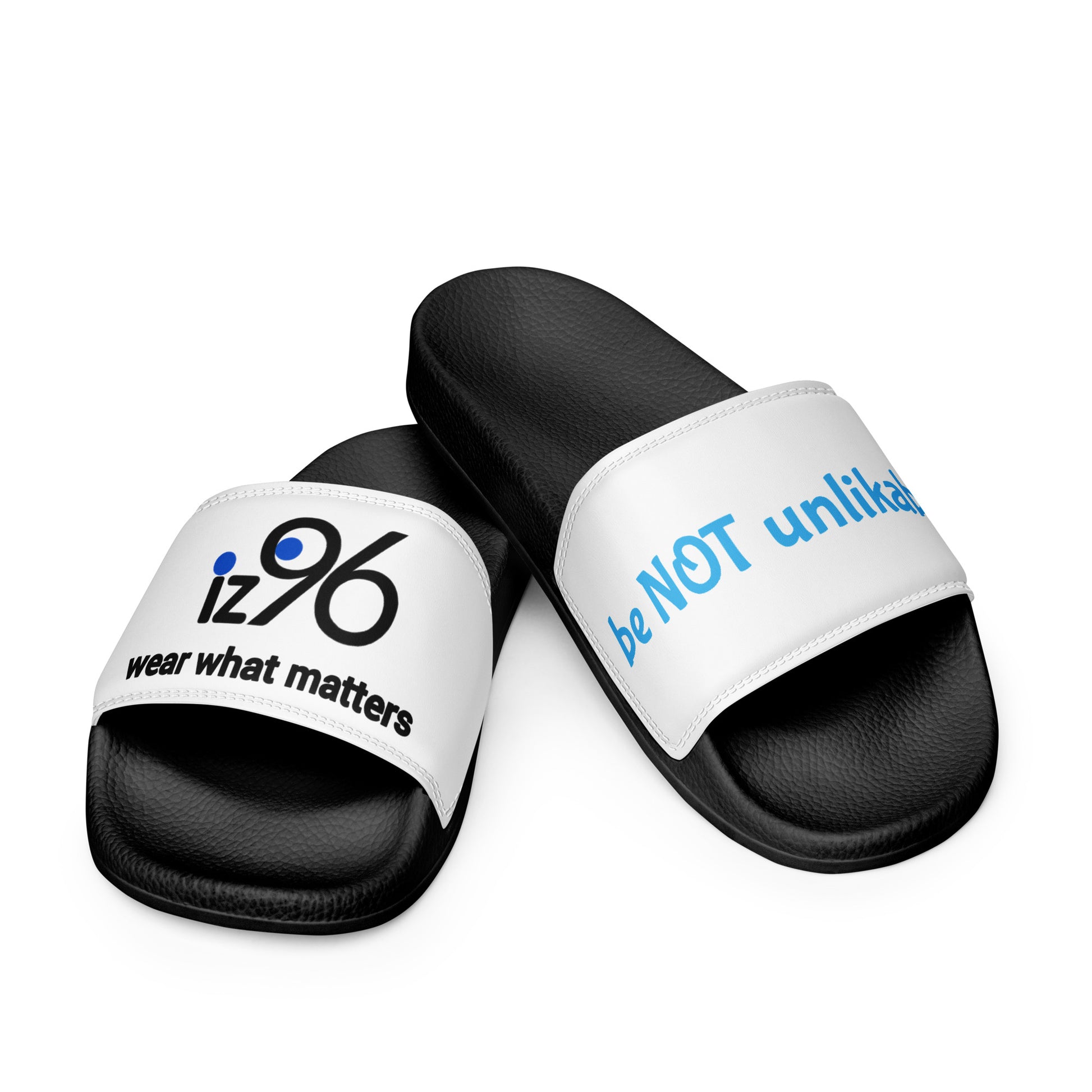 Black slides with white straps featuring text on a white background