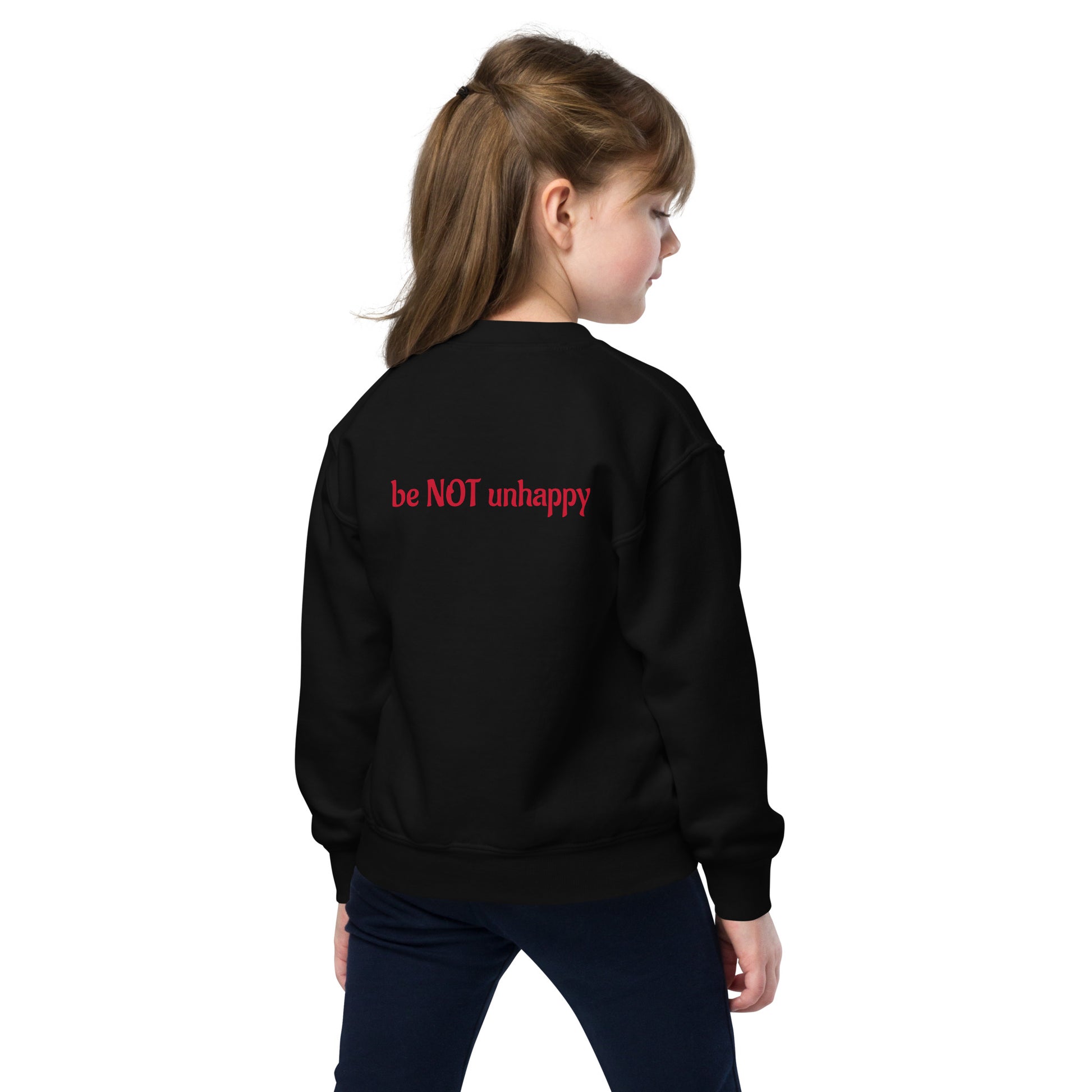 Child wearing a black sweatshirt on a white background