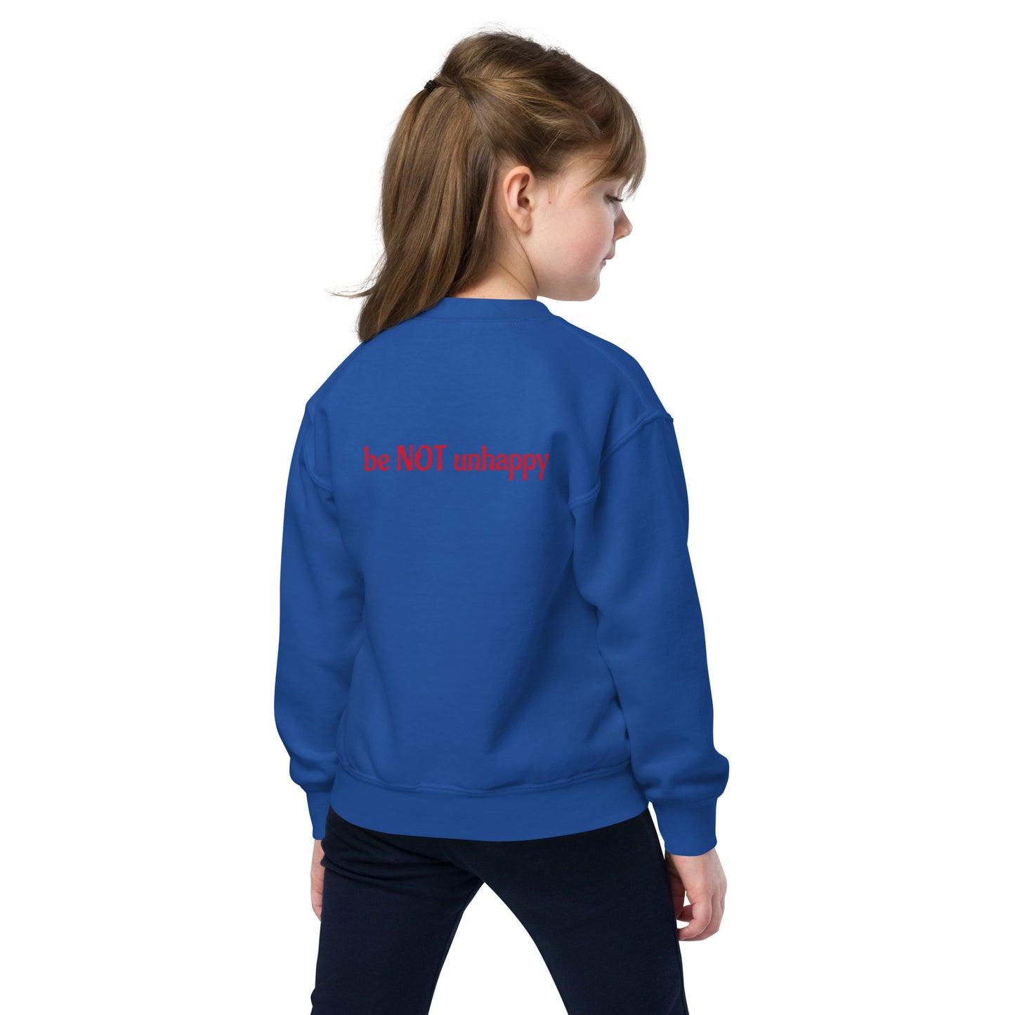 Child wearing a blue sweatshirt with a text on the back against a white background