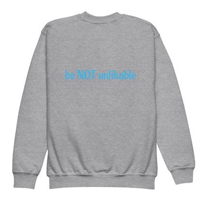 Gray sweatshirt with 'be not unlikable' text on the back against a white background