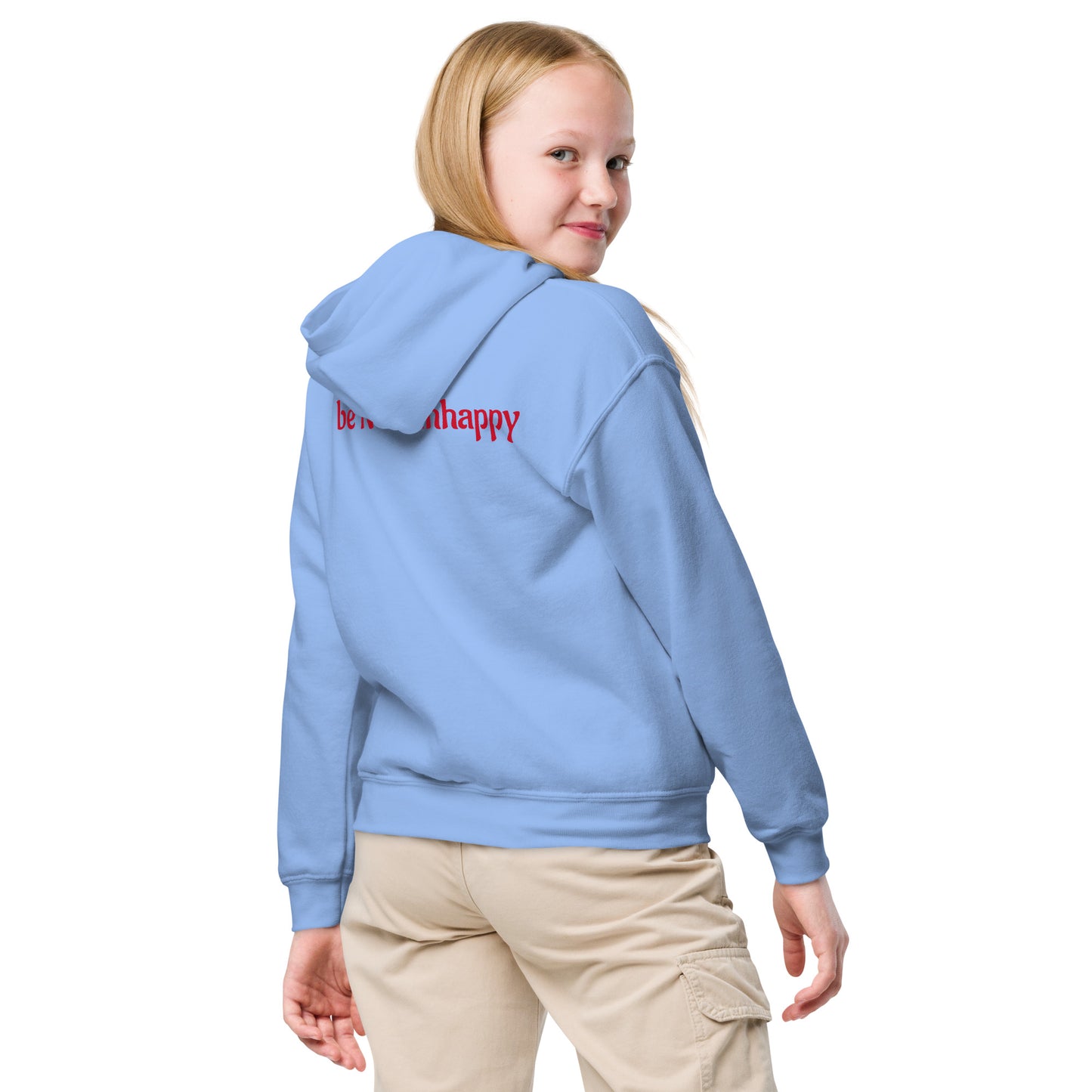 Child wearing a light blue hoodie with text on the back, standing against a white background