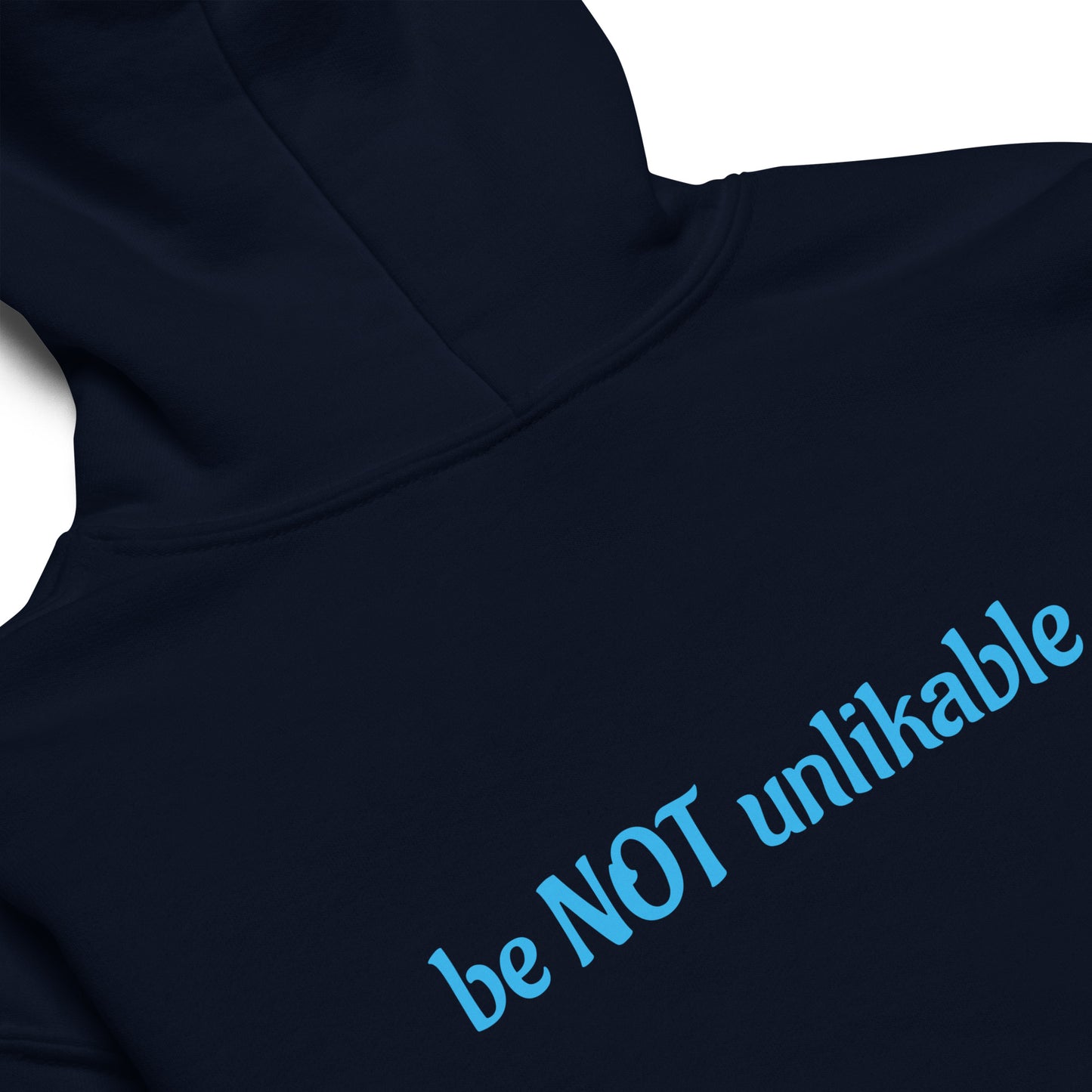 Navy hoodie with 'be NOT unlikable' text in light blue on a white background