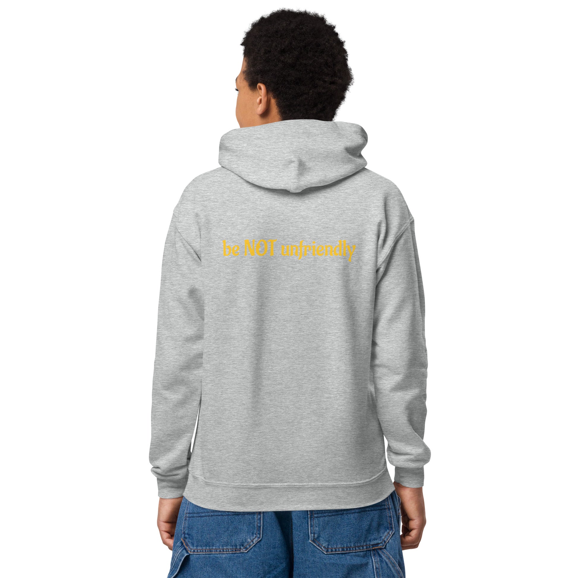 Person wearing a gray hoodie with a logo on the back, standing against a white background