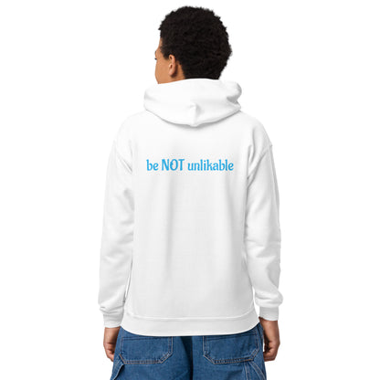 Person wearing a white hoodie with 'be NOT unlikable' text on the back, standing against a white background.