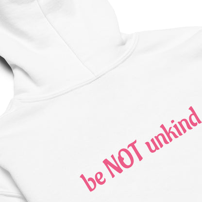 White shirt with pink text 'be NOT unkind' on a white background