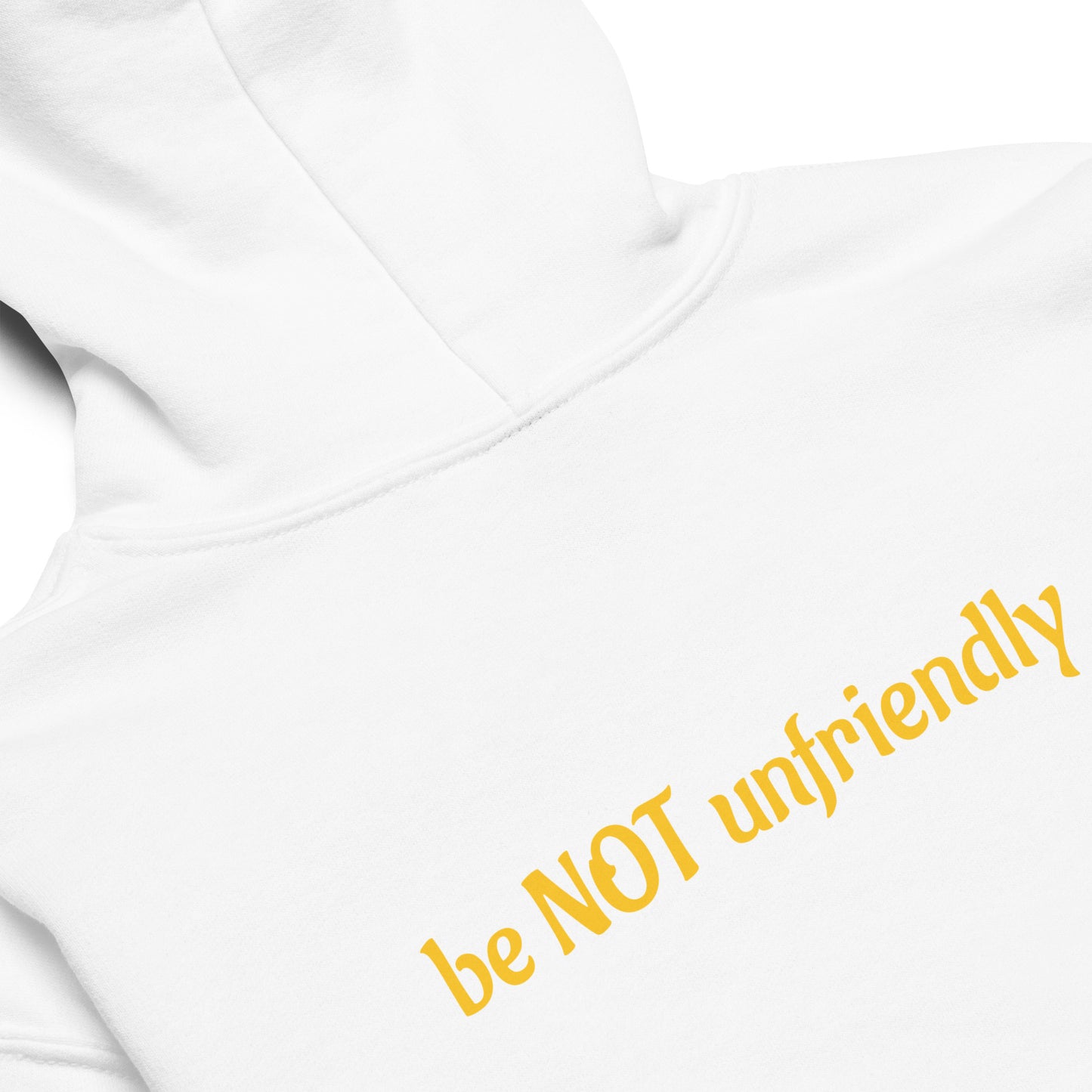White shirt with yellow text 'be NOT unfriendly' on a white background