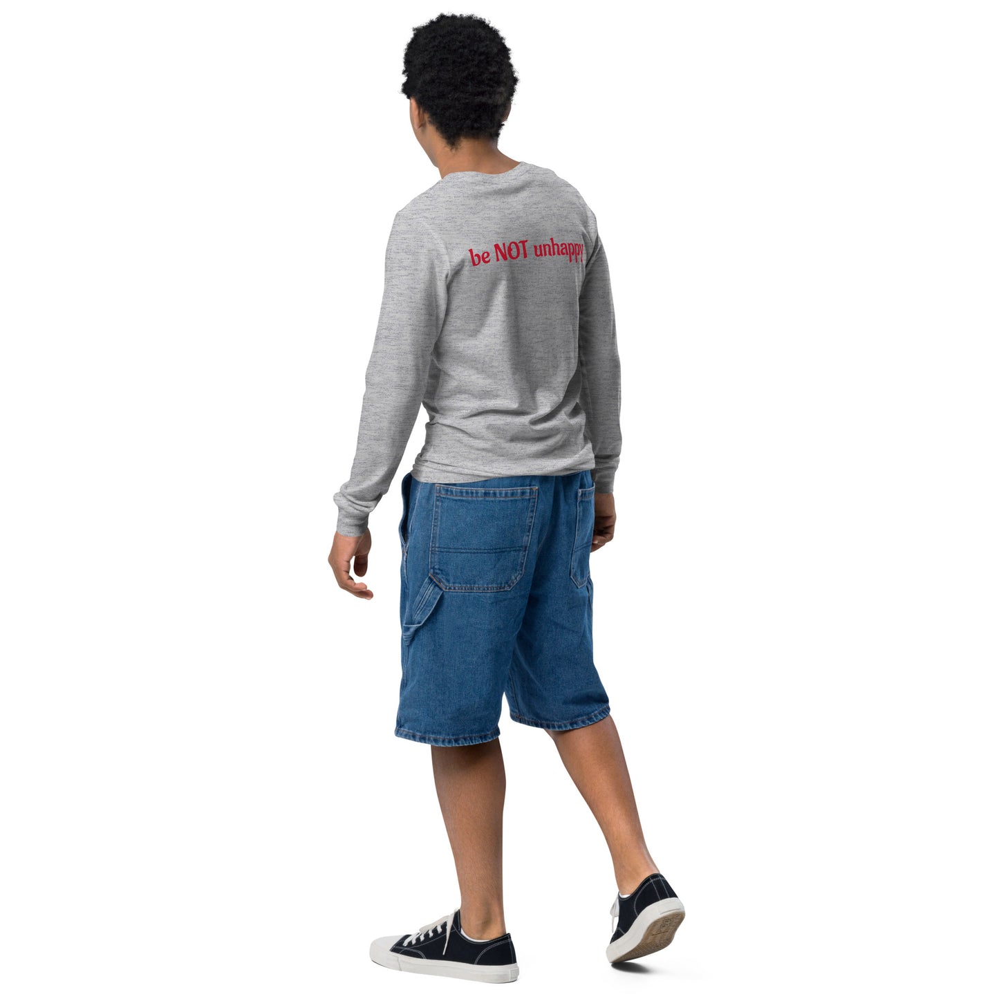 Boy wearing long sleeve 'be not unhappy' text on a white background