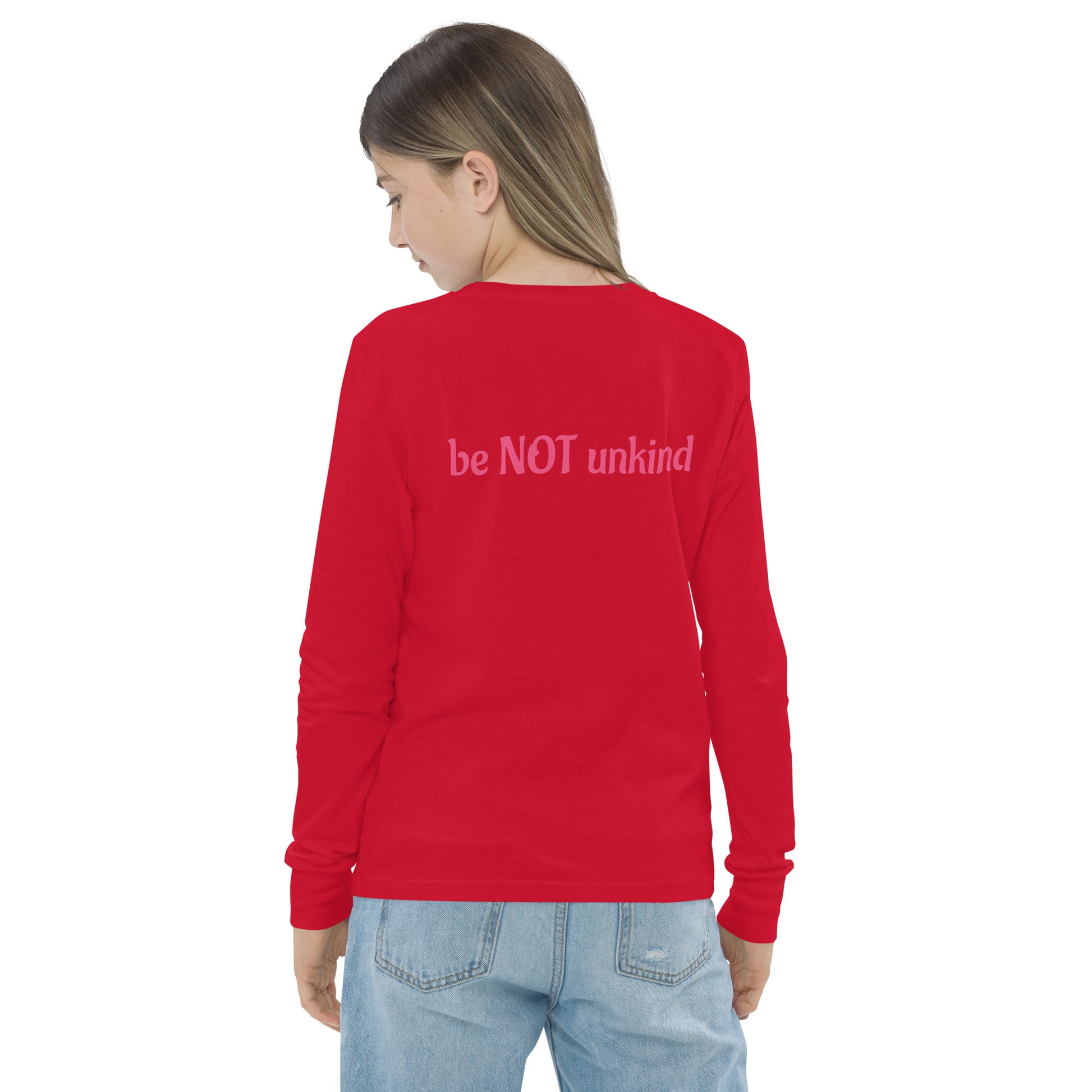 Red long-sleeve shirt with 'be NOT unkind' text on the back, worn by a person.