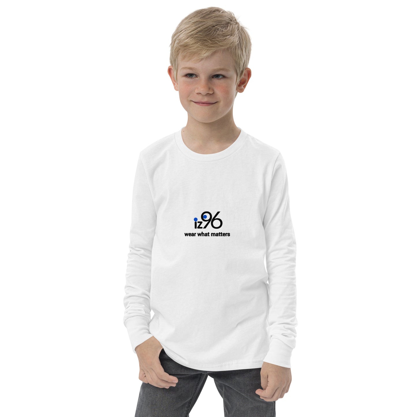 Child wearing a white long-sleeve shirt with a logo and text on a white background