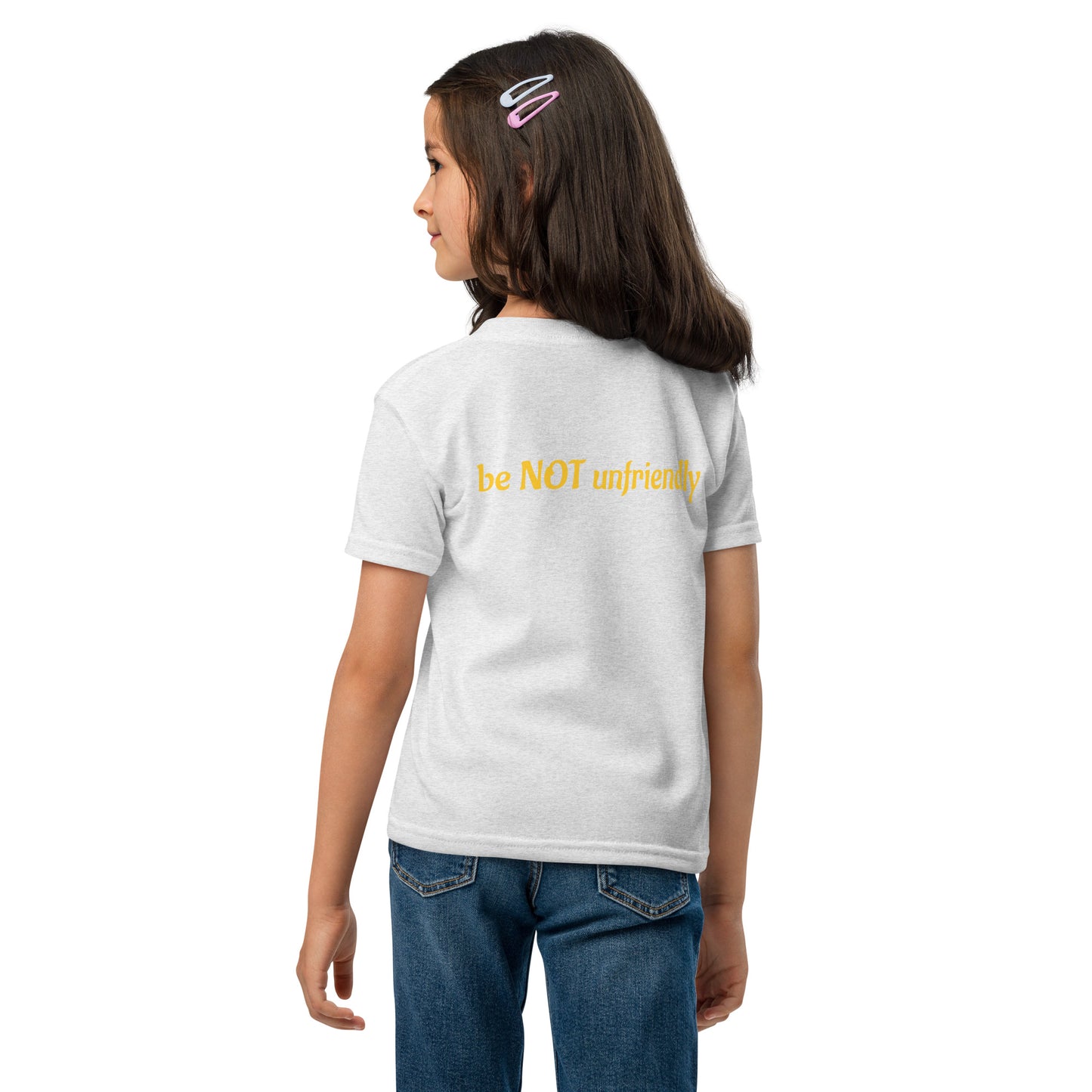 Child wearing a white t-shirt and blue jeans on a white background