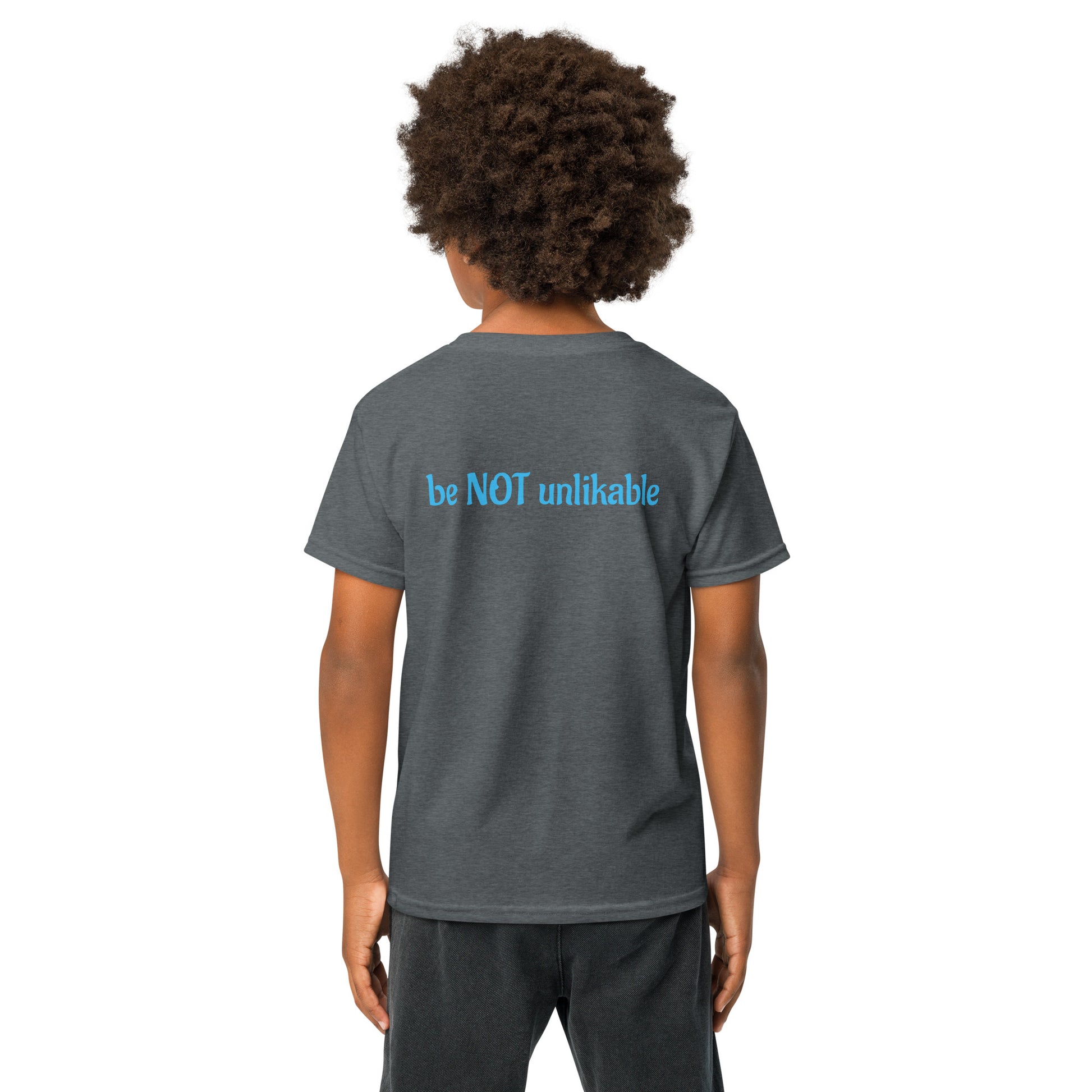 Boy wearing tshirt with text on a white background