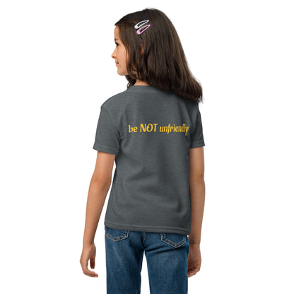 Child wearing a gray t-shirt with a text on the back, standing against a white background.